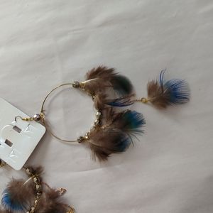 Hoop Boho earrings with feathers